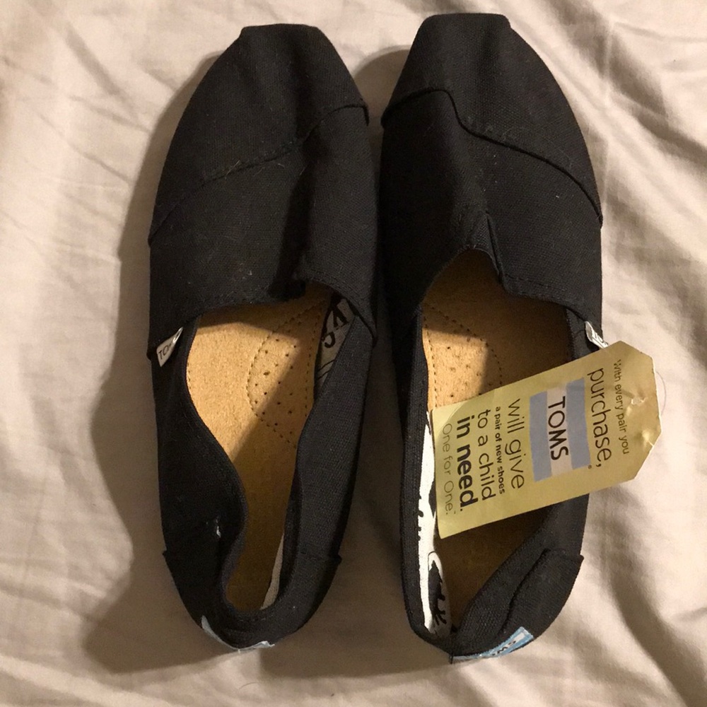 Toms , black. Size M12